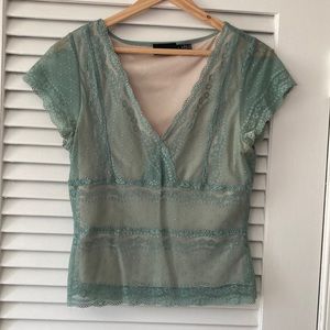 Blue-green womens top. Size small. Worn less than 6 times